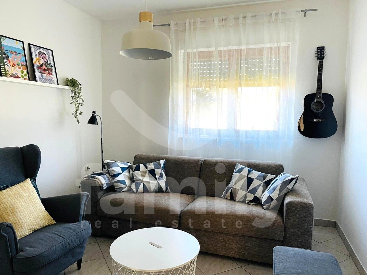 37.053